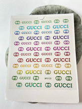 Load image into Gallery viewer, RAINBOW METALLIC Logo Stickers GG